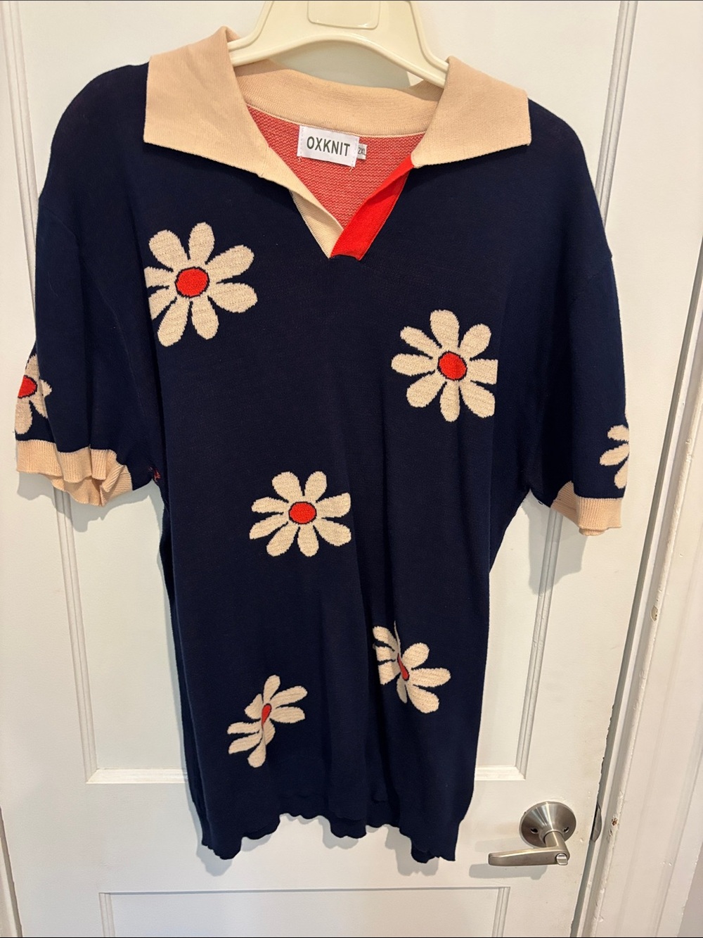 OXKNIT Navy V-Neck Sweater with Cream Daisy Motif